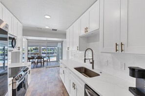 House, 2 Bedrooms | Private kitchen - Punta Gorda Isles 2-Bedroom Private Pool Home on Canal with Dock 2 Home (Punta Gorda)