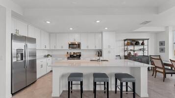 Condo, 2 Bedrooms | Private kitchen | Fridge, oven, coffee/tea maker