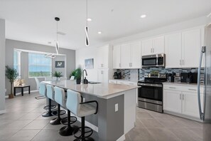 Appart'hôtel, 2 chambres | Cuisine privée | Réfrigérateur, four, cafetière/bouilloire, grille-pain