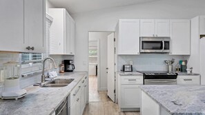 House, 3 Bedrooms | Private kitchen | Fridge, oven, coffee/tea maker, toaster - Downtown Sarasota Private Vacation Home - Minutes To Beaches, Beautiful Backyard, And Pet-friendly! 3 Bedroom Home (Sarasota)