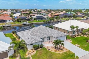 House, 3 Bedrooms | Exterior - Punta Gorda 3-Bedroom Canalfront Vacation Home with Pool 3 Home (Punta Gorda)