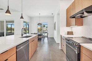 House, 3 Bedrooms | Private kitchen | Fridge, oven, coffee/tea maker, toaster - Punta Gorda 3-Bedroom Canalfront Vacation Home with Pool 3 Home (Punta Gorda)
