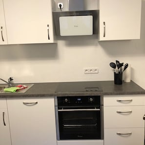 Lägenhet - balkong - utsikt mot trädgården | Eget kök