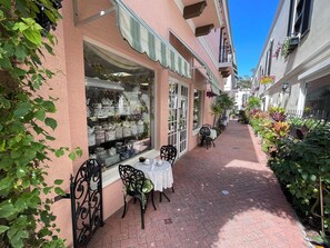 Outdoor dining - Sunset on Third – top floor 2BR/2BA Condo Steps from the Gulf & 5th Ave (Naples)