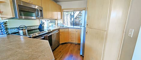 Condo, 1 Bedroom | Private kitchen | Fridge, oven, coffee/tea maker, toaster