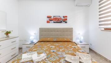 1 Schlafzimmer, BĂŒgeleisen/BĂŒgelbrett, WLAN, BettwĂ€sche