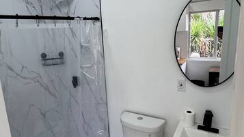 Hair dryer, towels, soap, toilet paper