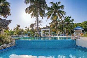Outdoor pool, cabanas (surcharge), pool umbrellas