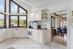 Coffee/tea maker, fridge, microwave, oven