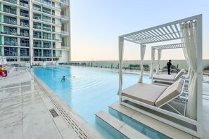 Pool - Minimalist Studio in Binghatti Azure (Jumeirah Village Circle (JVC))