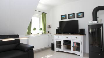Fernseher, Kamin, DVD-Player, Stereoanlage