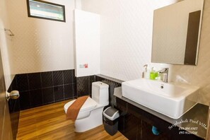 Shower, free toiletries, hair dryer, slippers