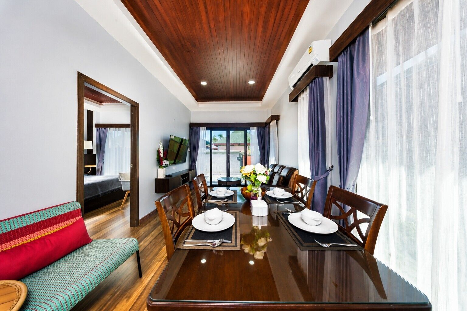 Family Villa | Living area | 50-inch LED TV with cable channels