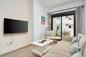 TV - Apartment 'Building Copenhagen, Nerja' with Shared Pool, Wi-Fi and Air Conditioning (Nerja)