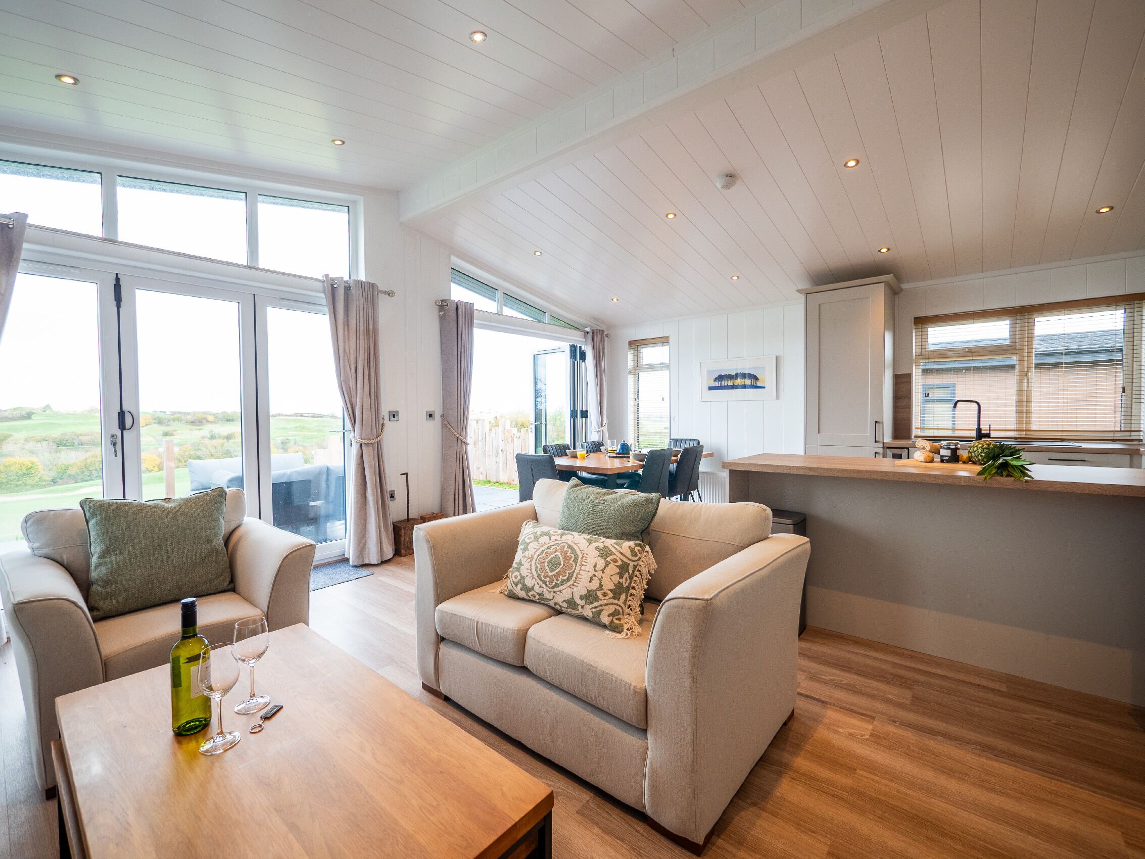 Cosy living area, With views over the golf course. 