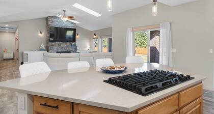 Serene coastal ambiance, fenced yard, fire pit, and outdoor furniture!
