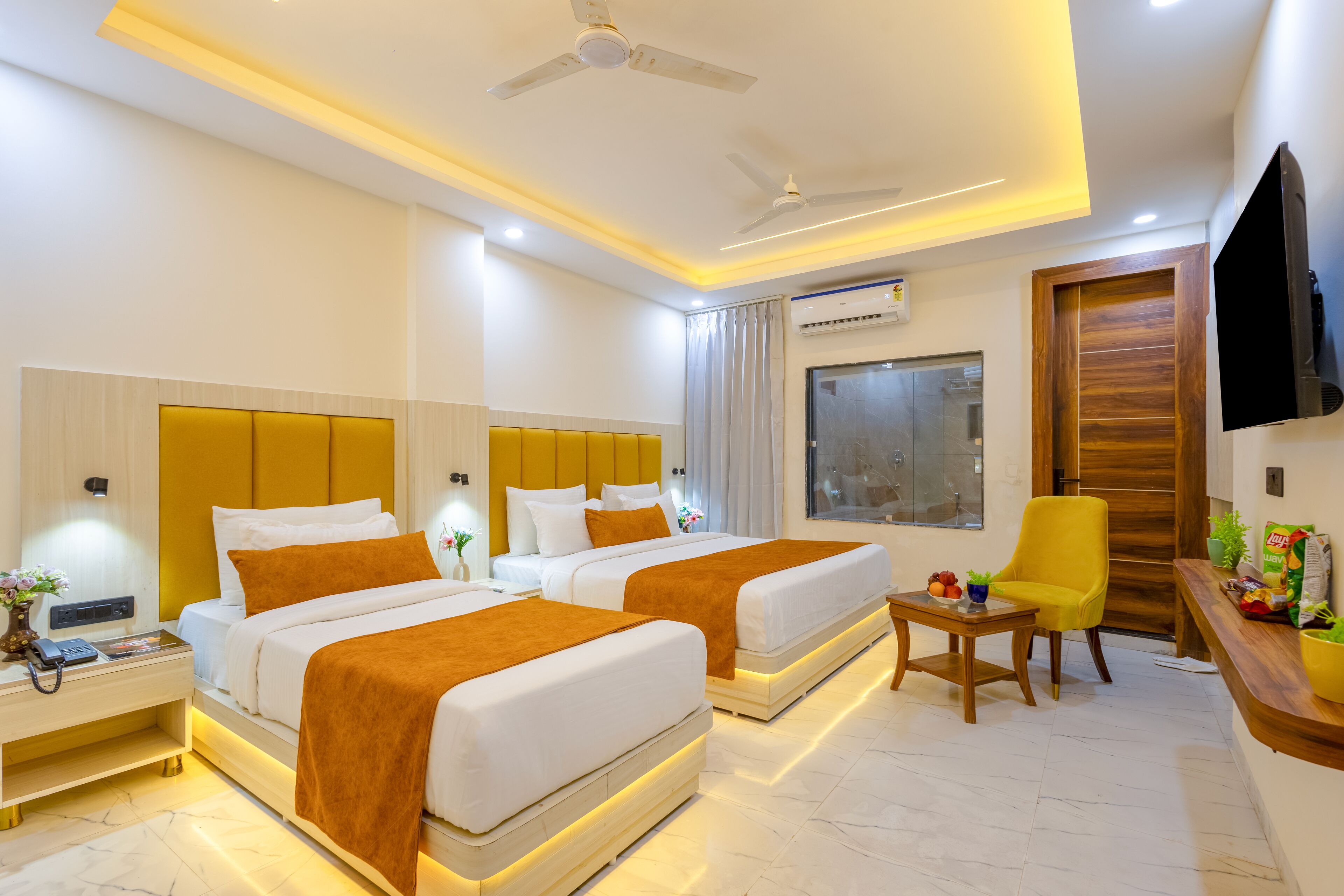 Deluxe Room, Multiple Beds, City View | Desk, laptop workspace, free WiFi