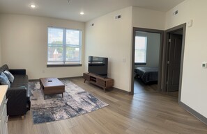 Apartamento luxo, 1 cama Queen e sofá-cama, cozinha, vista para o jardim | Área de estar