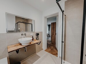 Hair dryer, towels, soap, toilet paper