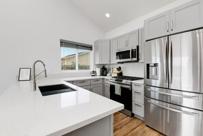 Fridge, microwave, oven, stovetop - Bright & Spacious | Modern Getaway (San Diego)