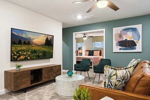 House (Multiple Bedrooms) | Living area | 50-inch Smart TV with cable channels - Home 9 Bed Themed Rooms, Pool, Storey Lake (Kissimmee)
