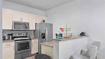 Villa (3 Bedrooms) | Private kitchen | Microwave, oven, high chair, blender