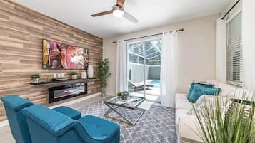 Villa (4 Bedrooms) | Living area | 50-inch Smart TV with cable channels