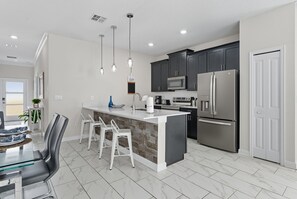 Villa (5 Bedrooms) | Private kitchen | Microwave, oven, highchair, blender - Modern 5BR Retreat, Pool, Water Park & More (Davenport)