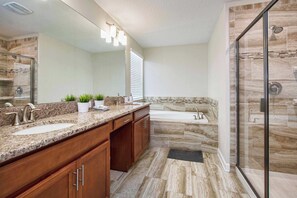 House (6 Bedrooms) | Bathroom | Bathtub, towels, soap, shampoo - Spacious 6 Bed Home With Pool in Storey Lake (Kissimmee)