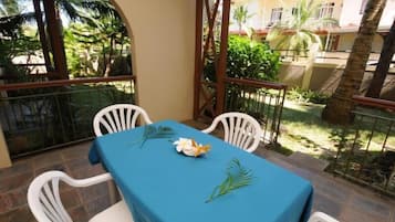 Standard Apartment, Balcony, Garden View | Terrace/patio