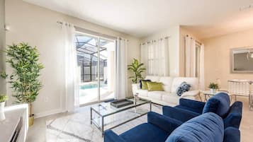 Villa (4 Bedrooms) | Living area | 60-inch TV with cable channels