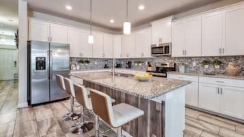 House (6 Bedrooms) | Private kitchen | Microwave, oven, highchair, blender