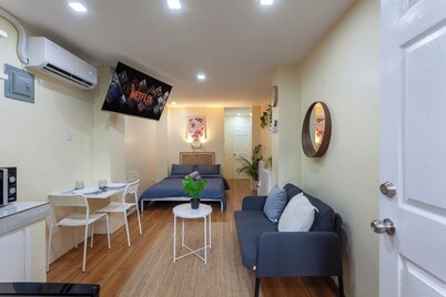 Cozy 1-bedroom studio in tranquil Quezon City with AC