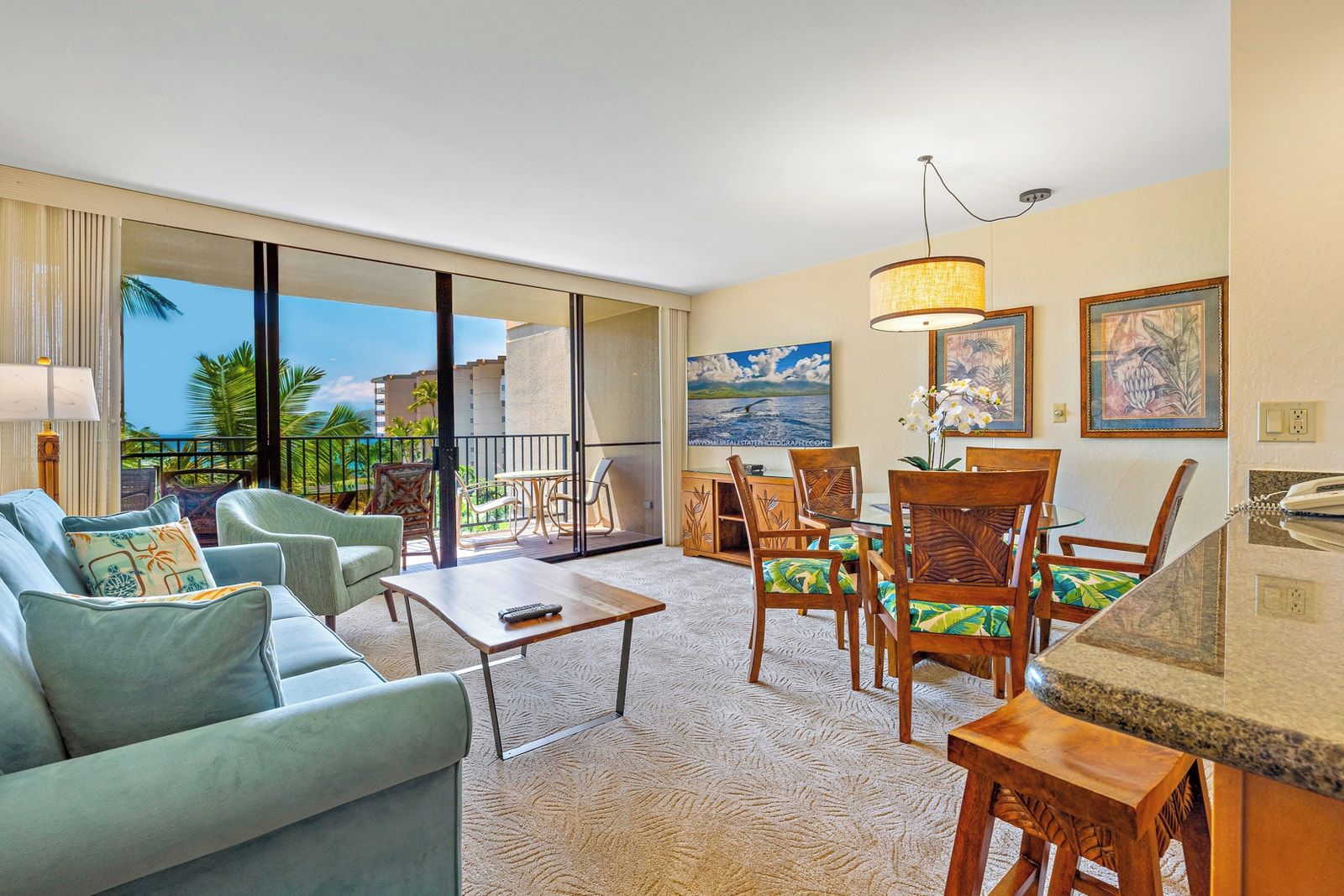 Palm-framed sunsets await beyond glass doors, while seafoam blues invite island daydreams inside     KS-535