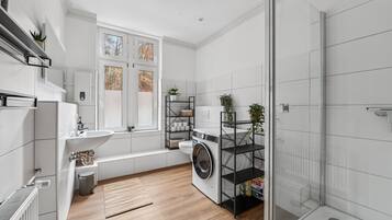 Shower, hair dryer, towels, soap