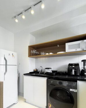 Deluxe Apartment, City View | Private kitchen - Update Vila Madalena by Wecare Hosting (São Paulo)