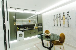 Fridge, microwave, oven, stovetop - Premium One Bedroom Apartment at KASS (Accra)