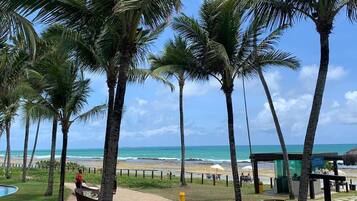 Apartamento | Praia | Na praia, areia branca