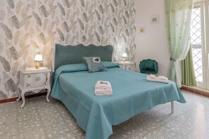 Classic Quadruple Room, Balcony | Individually decorated, individually furnished, blackout drapes - Fabiola Guest House (Pompei)