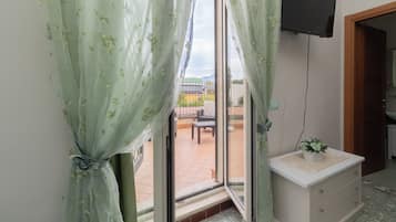 Classic Quadruple Room, Balcony | Individually decorated, individually furnished, blackout drapes