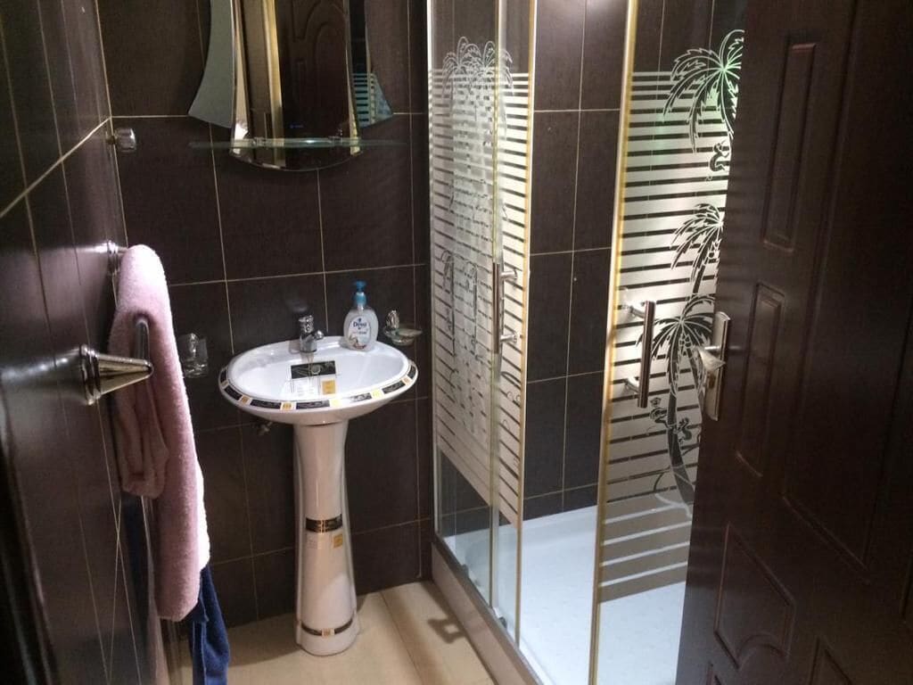 Shower, eco-friendly toiletries, towels, soap