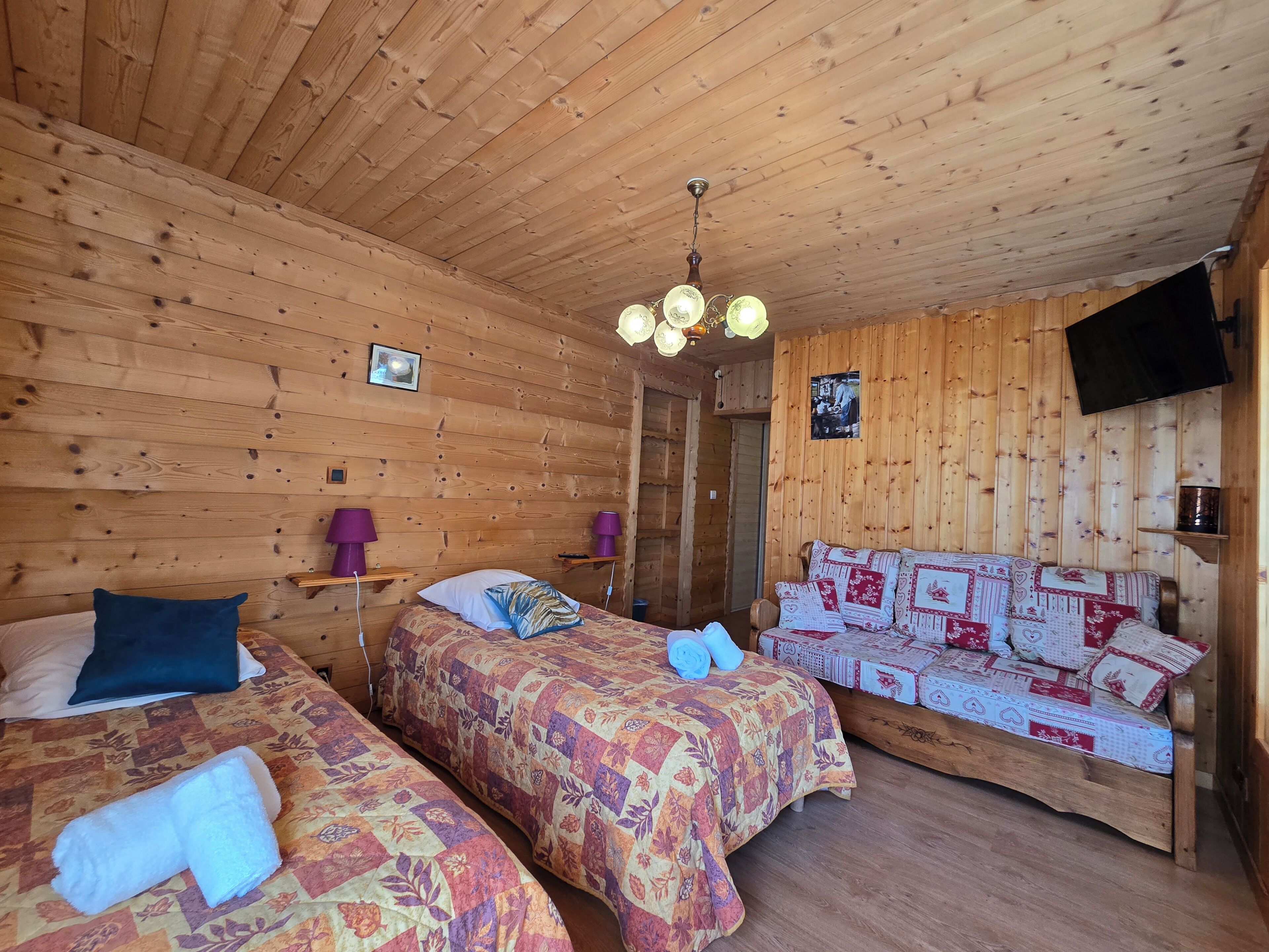 Habitación cuádruple familiar | Ropa de cama