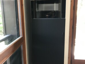 A room with a black cabinet and a window. - 2-room apartment at cable car base, pets allowed, parking (Arâches-la-Frasse)