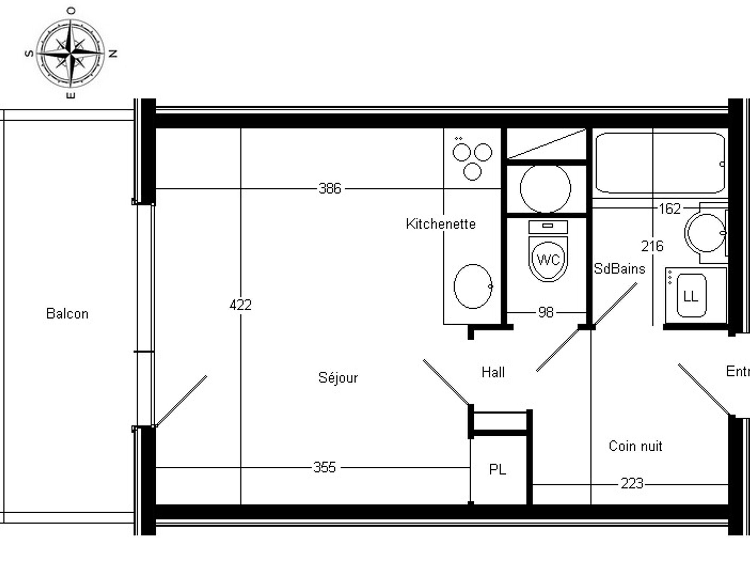 Plano de planta con balcón, kitchenette, aseo y armario para monedas.