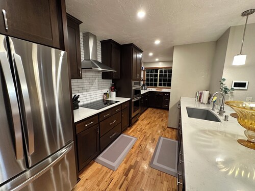 Spacious 4-bedroom home centered in the countryside only 6 minutes from downtown