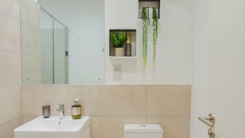 Shower, eco-friendly toiletries, towels, soap