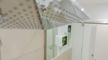 Shower, eco-friendly toiletries, towels, soap