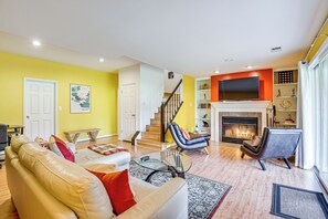 TV, fireplace, books