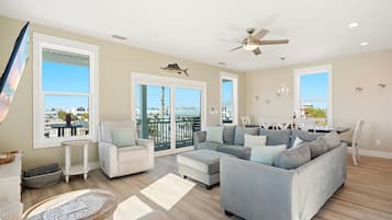 House (4 Bedrooms) | Living area | 65-inch Smart TV with digital channels