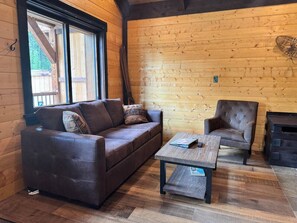 Living area - Mountaineer Creekside Cabin - Private Hot Tub (Golden)